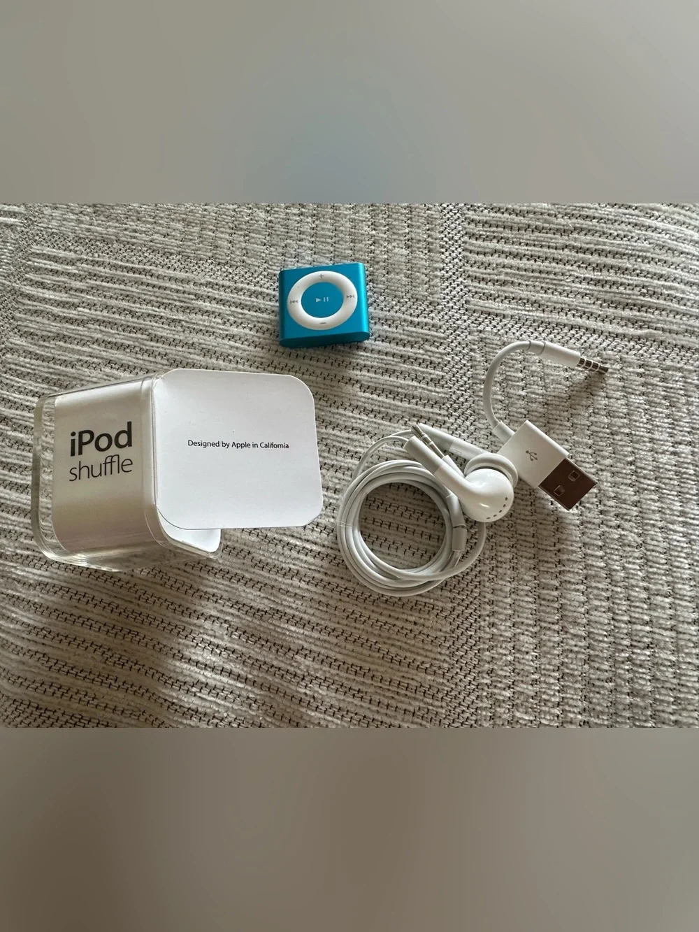 2gb Blue iPod Shuffle with Accessories- original packaging-never used.